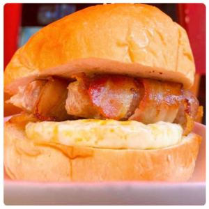 2 PIGS IN BLANKET WITH EGG BUTTY